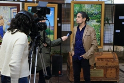 Sergio Caffarena junto a camarografo y reportero
